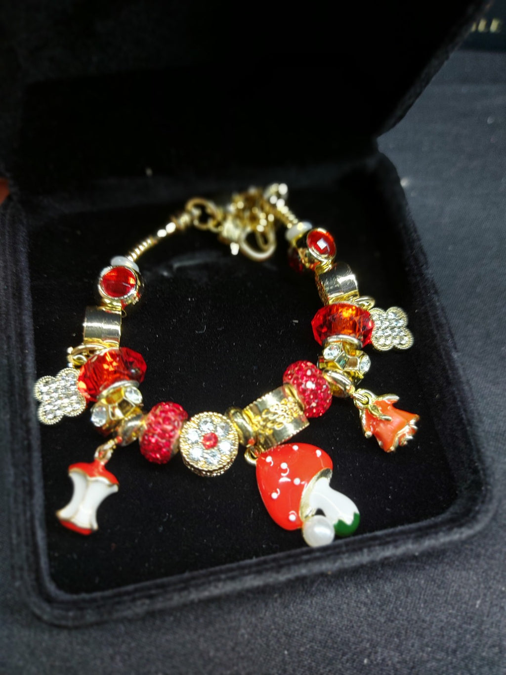 Red Enchanted Garden charm bracelet front view