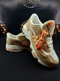 New Balance 1000 Brown Orange kids size 5Y photo 1