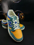 New Balance 480 Kids – Green/Orange – Size 7Y