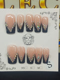 Close-up of Midnight Glam nails