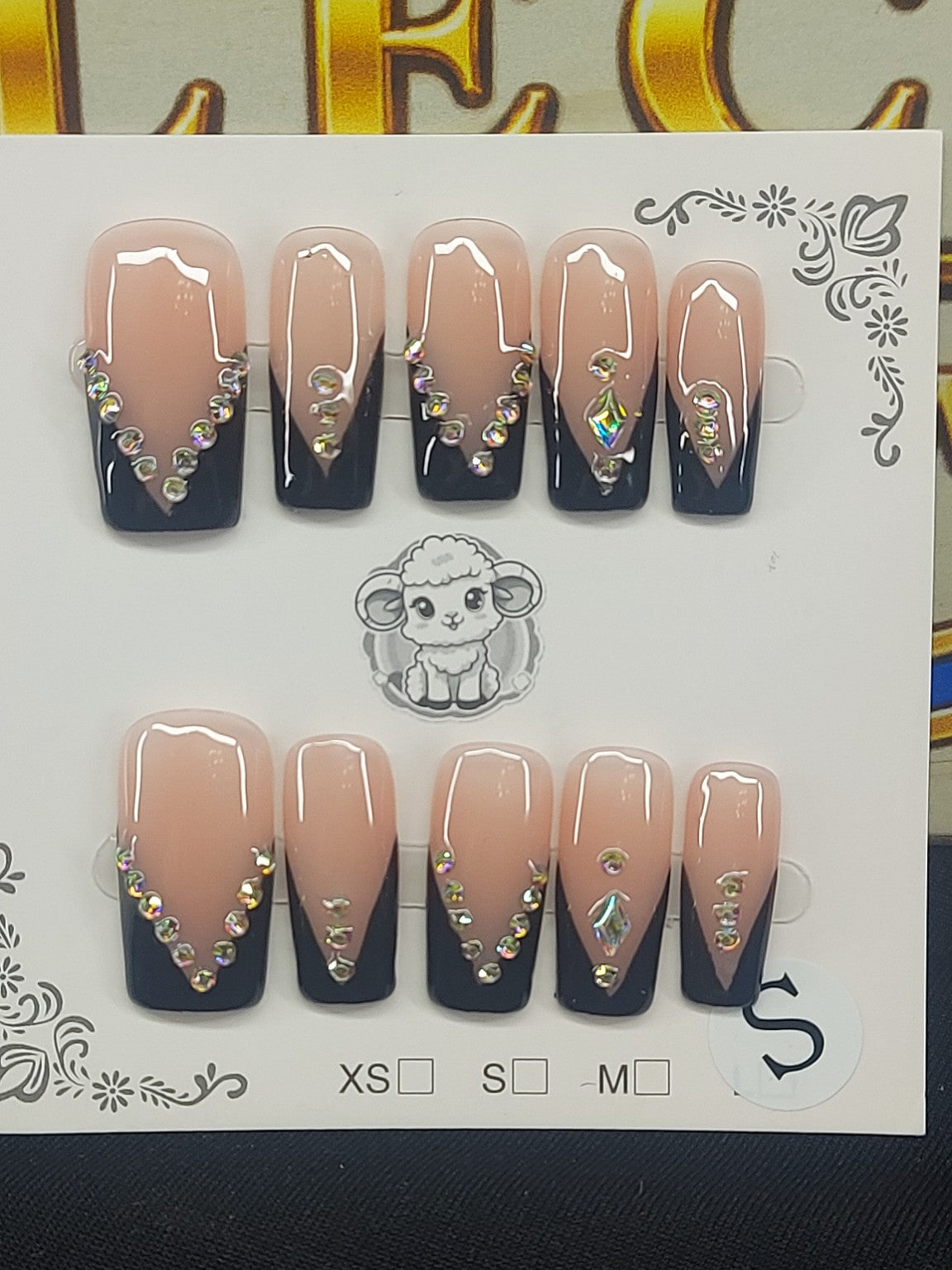 Close-up of Midnight Glam nails
