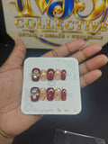 Burgundy Luxe nails close-up