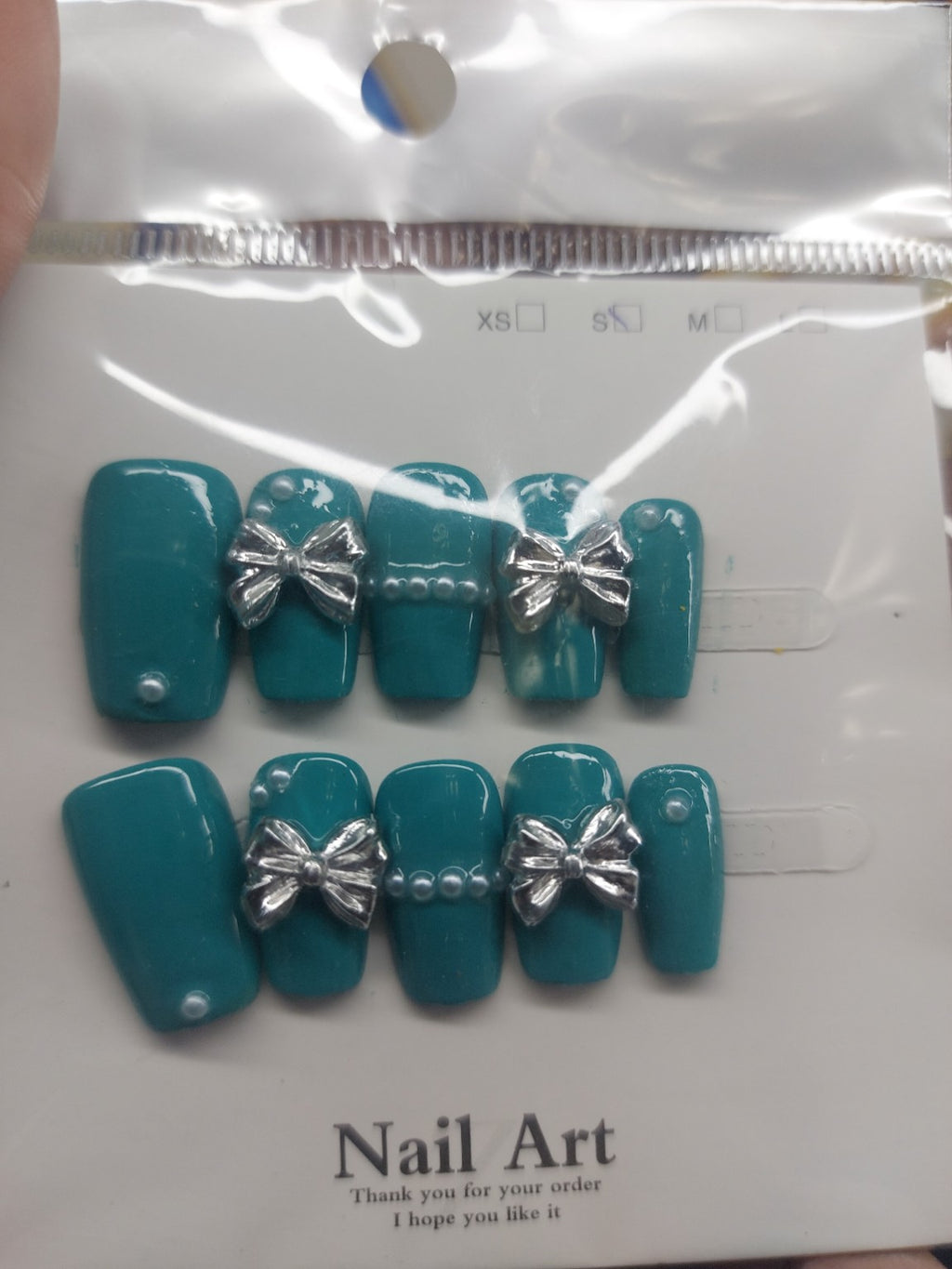 Teal Silver Bow Elegance close-up