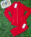 Red jacket with gold zippers and matching leggings, original product photo