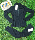 Black polka dot jacket and matching leggings set
