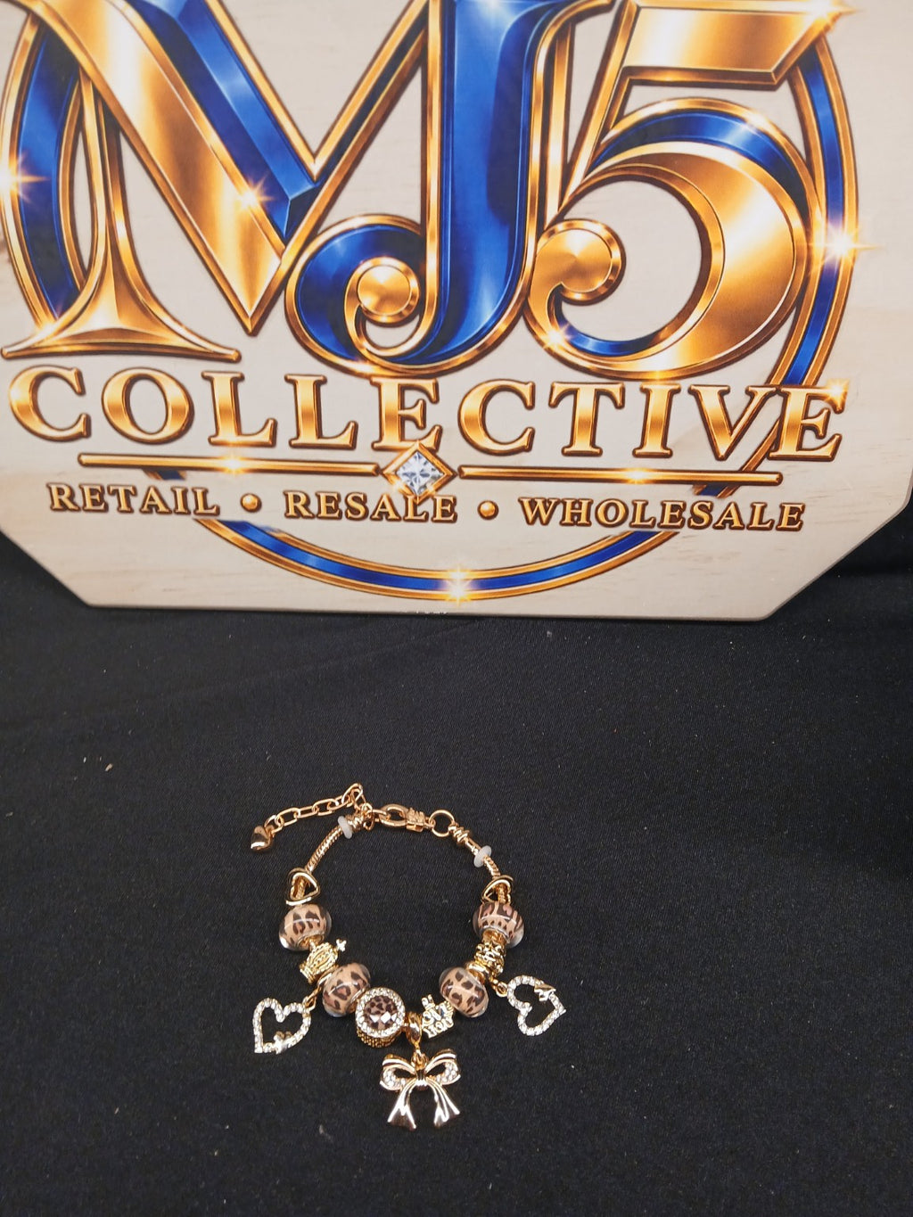 Golden Leopard Bow Charm Bracelet full display with MJ5 branding