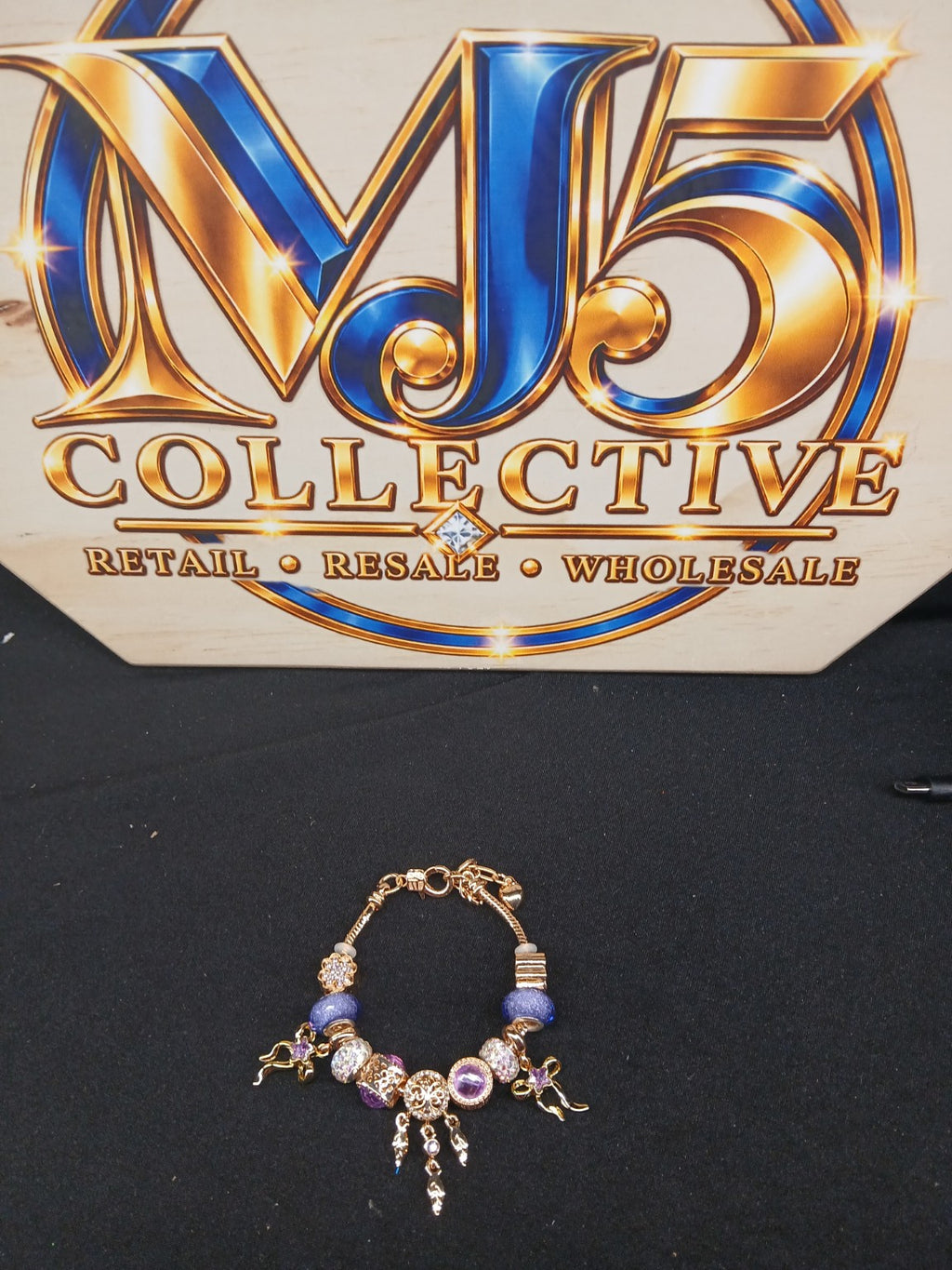 Violet Dreamcatcher Charm Bracelet full view with MJ5 Collective branding