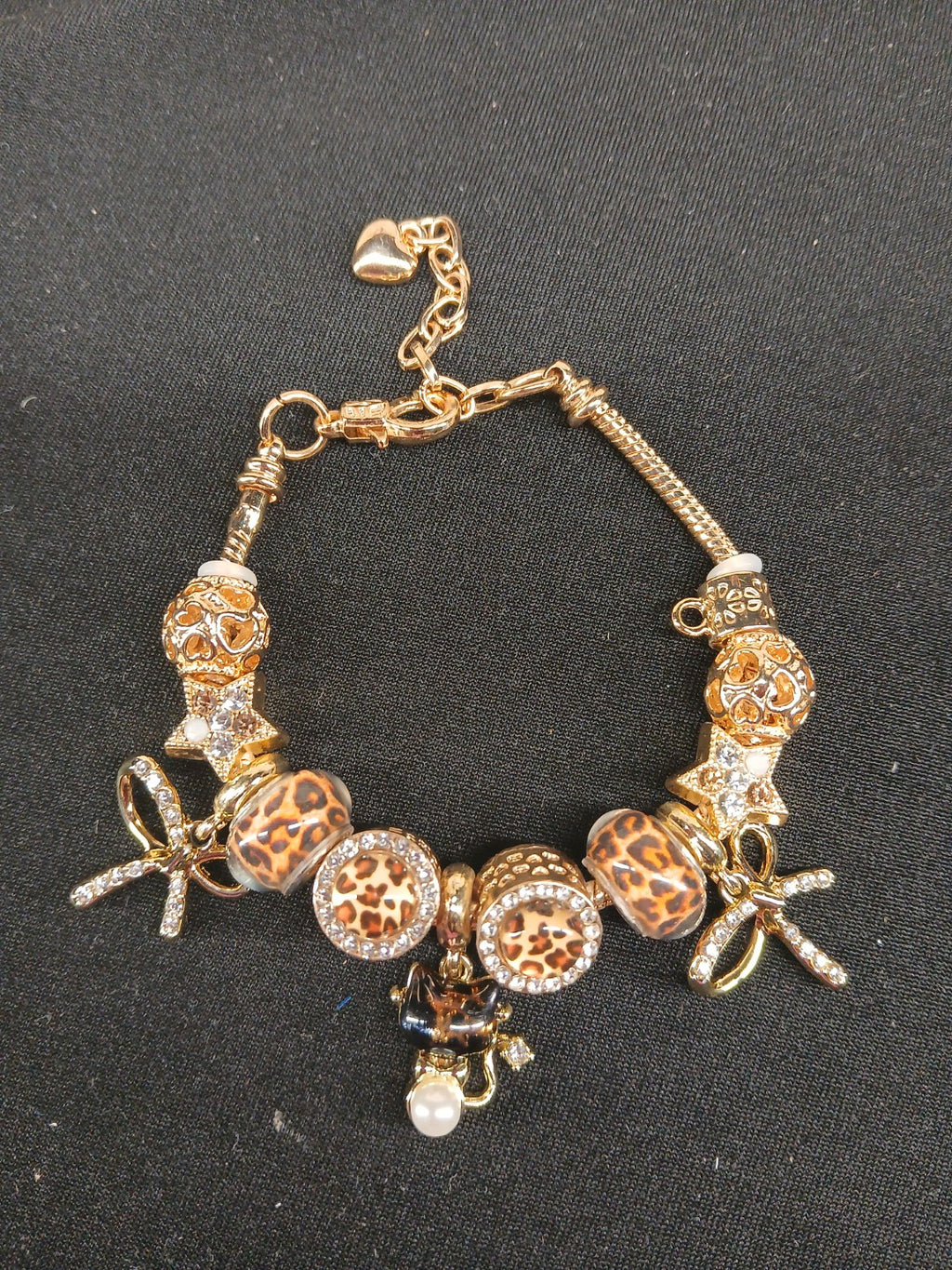 Golden Leopard Kitty Charm Bracelet close-up of leopard-print beads and gold charms