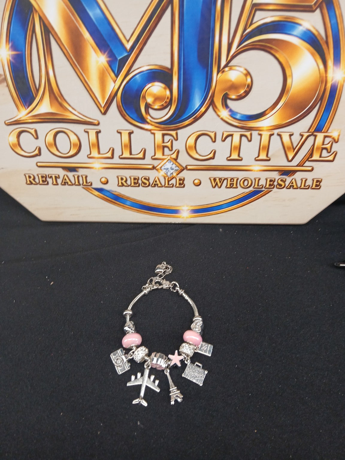 Pink Jetsetter Travel Charm Bracelet full view with MJ5 Collective branding