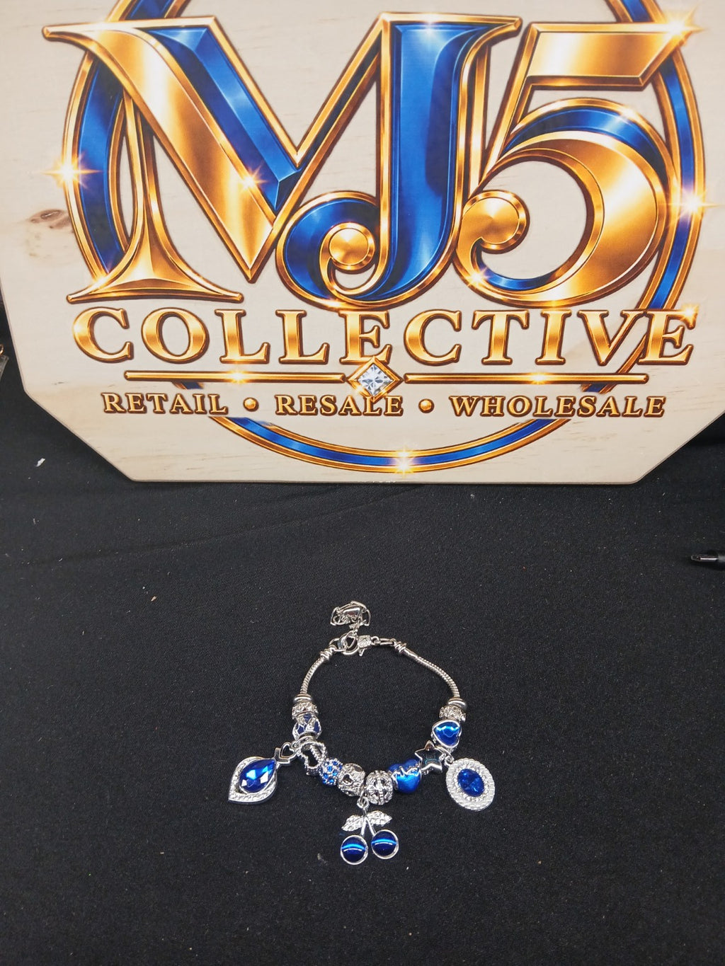 Sapphire Blue Cherry Sparkle Charm Bracelet full view with MJ5 Collective branding