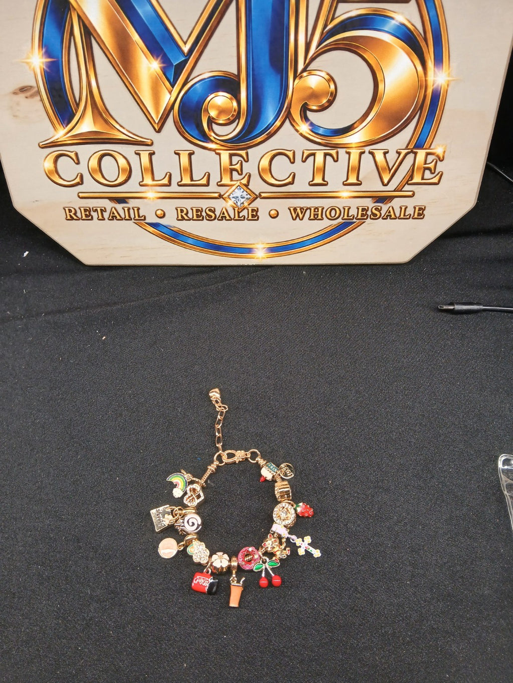 Sweet Treats Rainbow Cherry Charm Bracelet full display with MJ5 branding