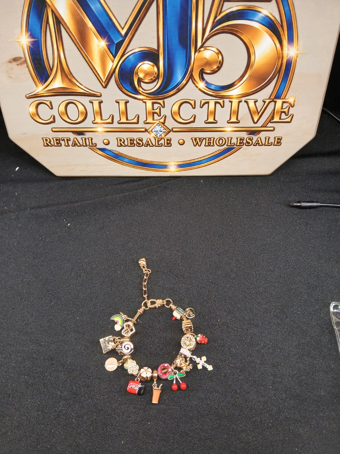 Sweet Treats Rainbow Cherry Charm Bracelet full display with MJ5 branding