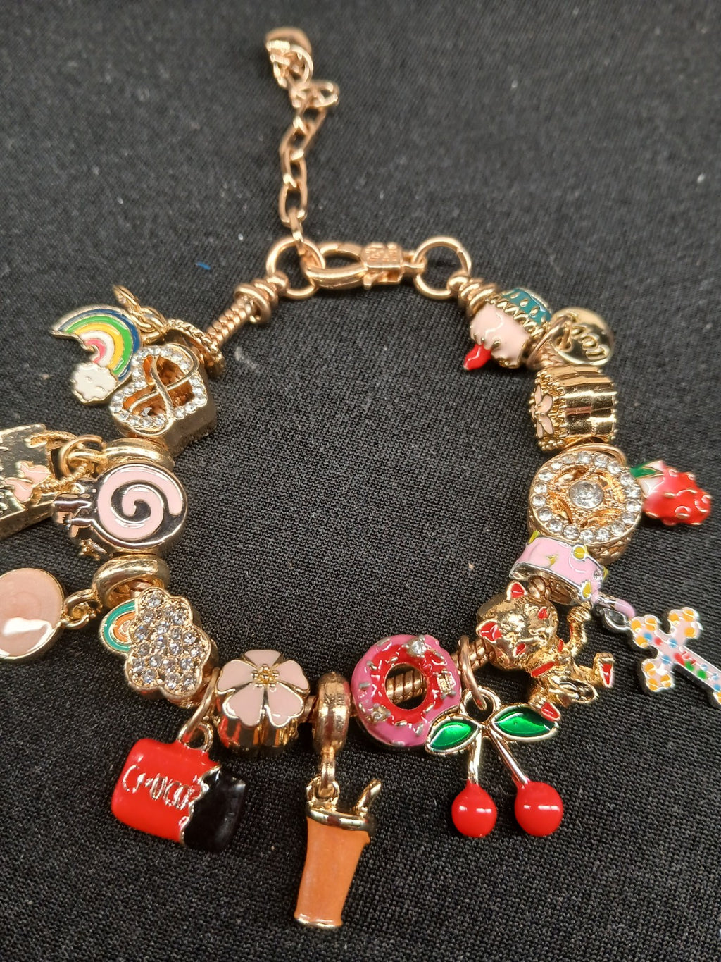 Sweet Treats Rainbow Cherry Charm Bracelet close-up with donut, cherries and rainbow