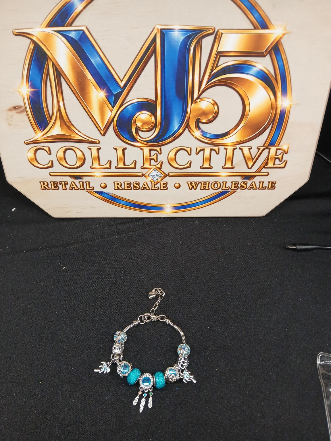 Turquoise Dreamcatcher Sparkle Charm Bracelet full display with MJ5 branding
