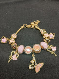 Blush Butterfly Garden Charm Bracelet close-up with pink butterfly and flower charms