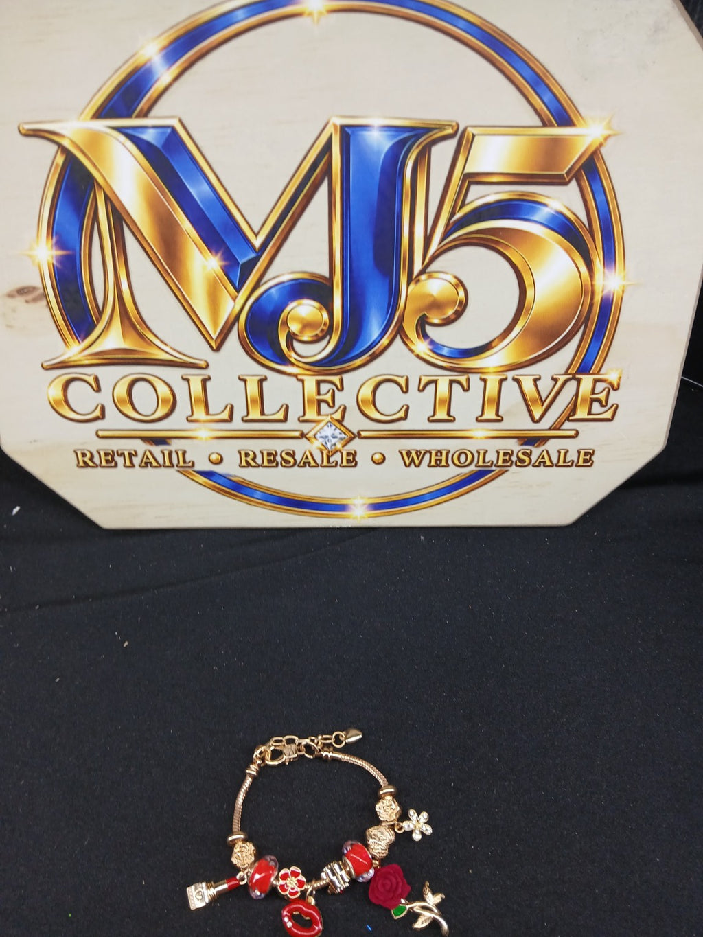Ruby Rose Kiss Charm Bracelet full display with MJ5 branding