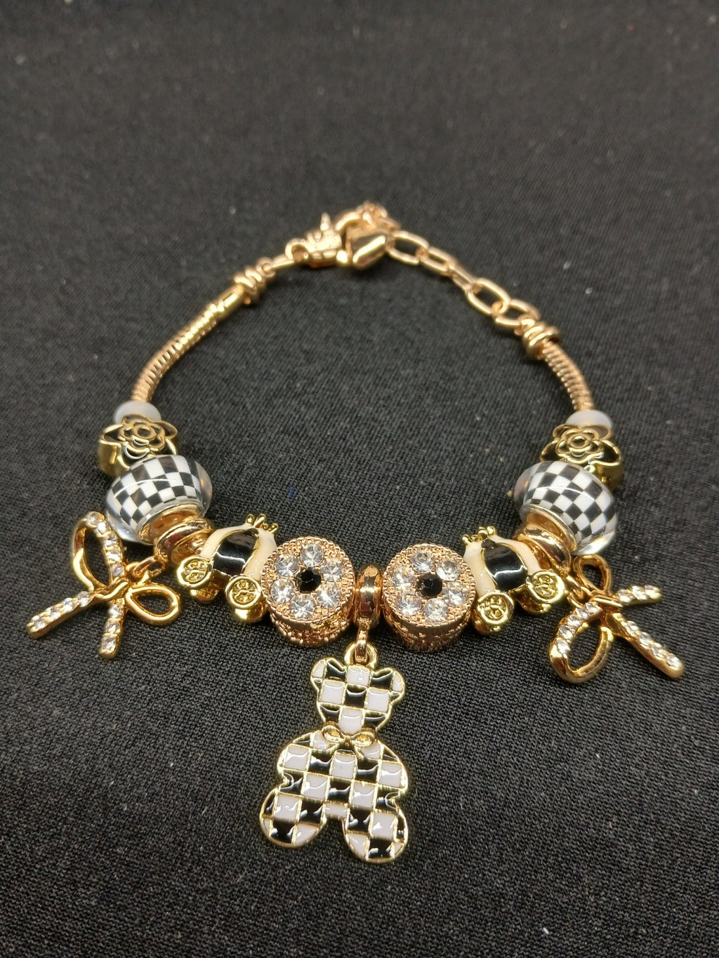 Checkerboard Teddy Bear Charm Bracelet close-up