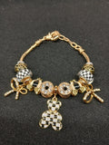 Checkerboard Teddy Bear Charm Bracelet close-up
