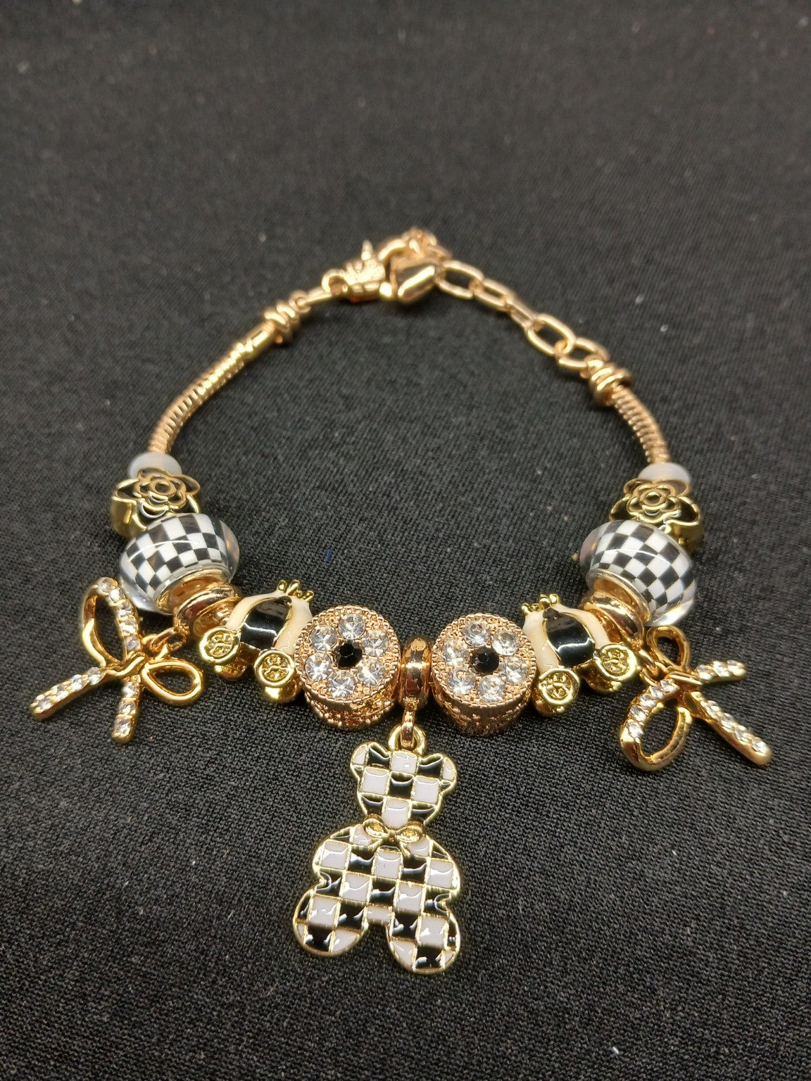 Checkerboard Teddy Bear Charm Bracelet close-up
