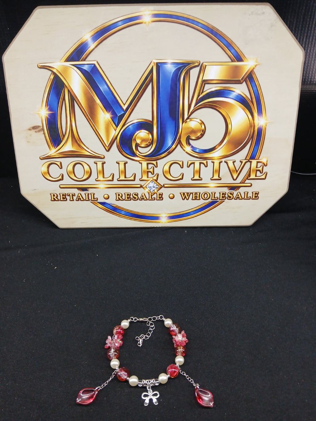Pink floral and pearl bow bracelet full view