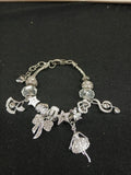 Close-up silver music and dance bracelet