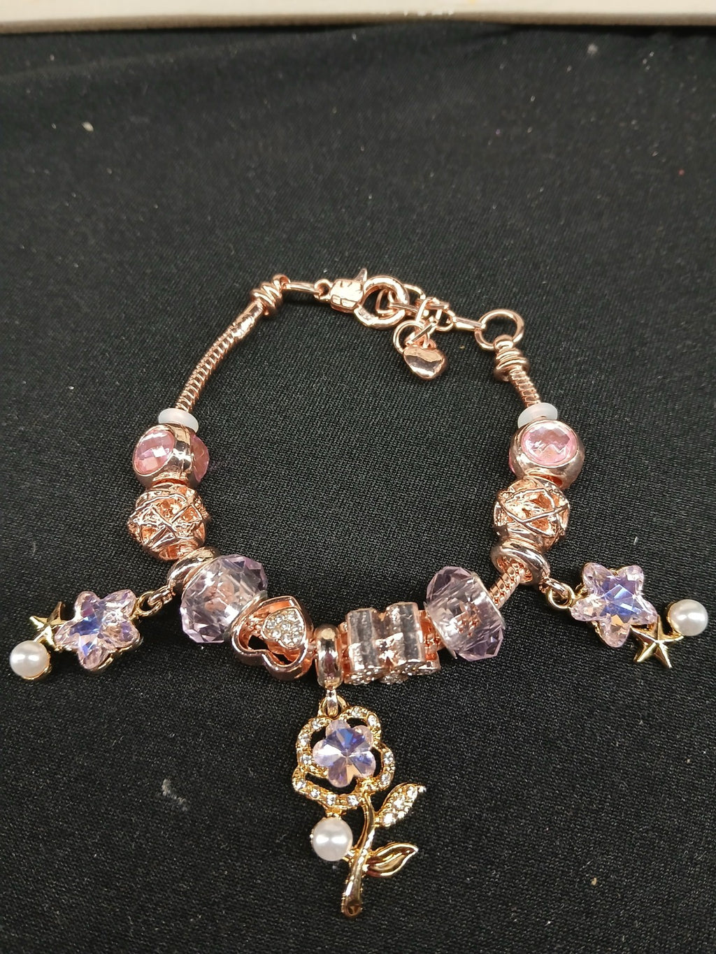 Close-up lavender flower charm bracelet