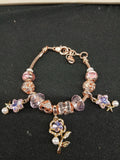 Close-up lavender flower charm bracelet