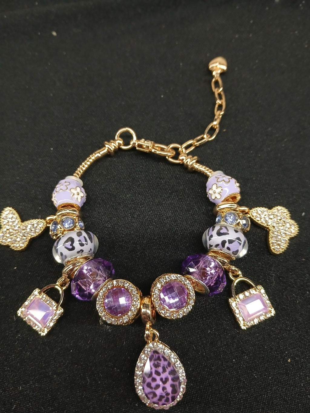 Purple leopard charm bracelet close-up
