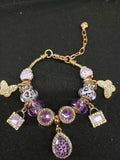 Purple leopard charm bracelet close-up