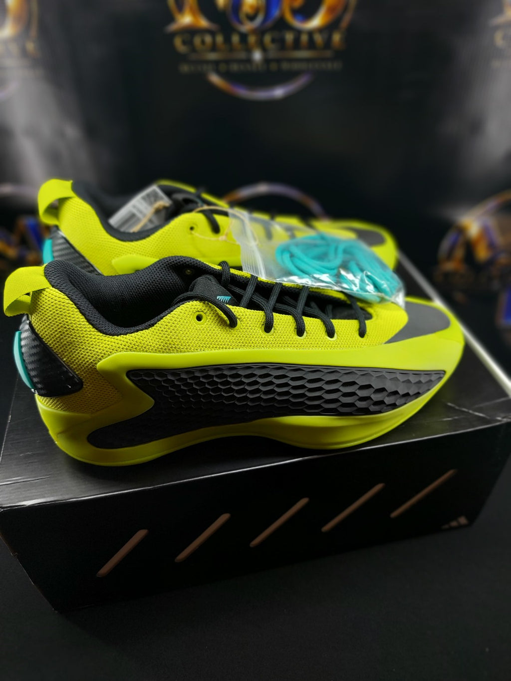 adidas AE 1 Low lime black pair on box with extra teal laces