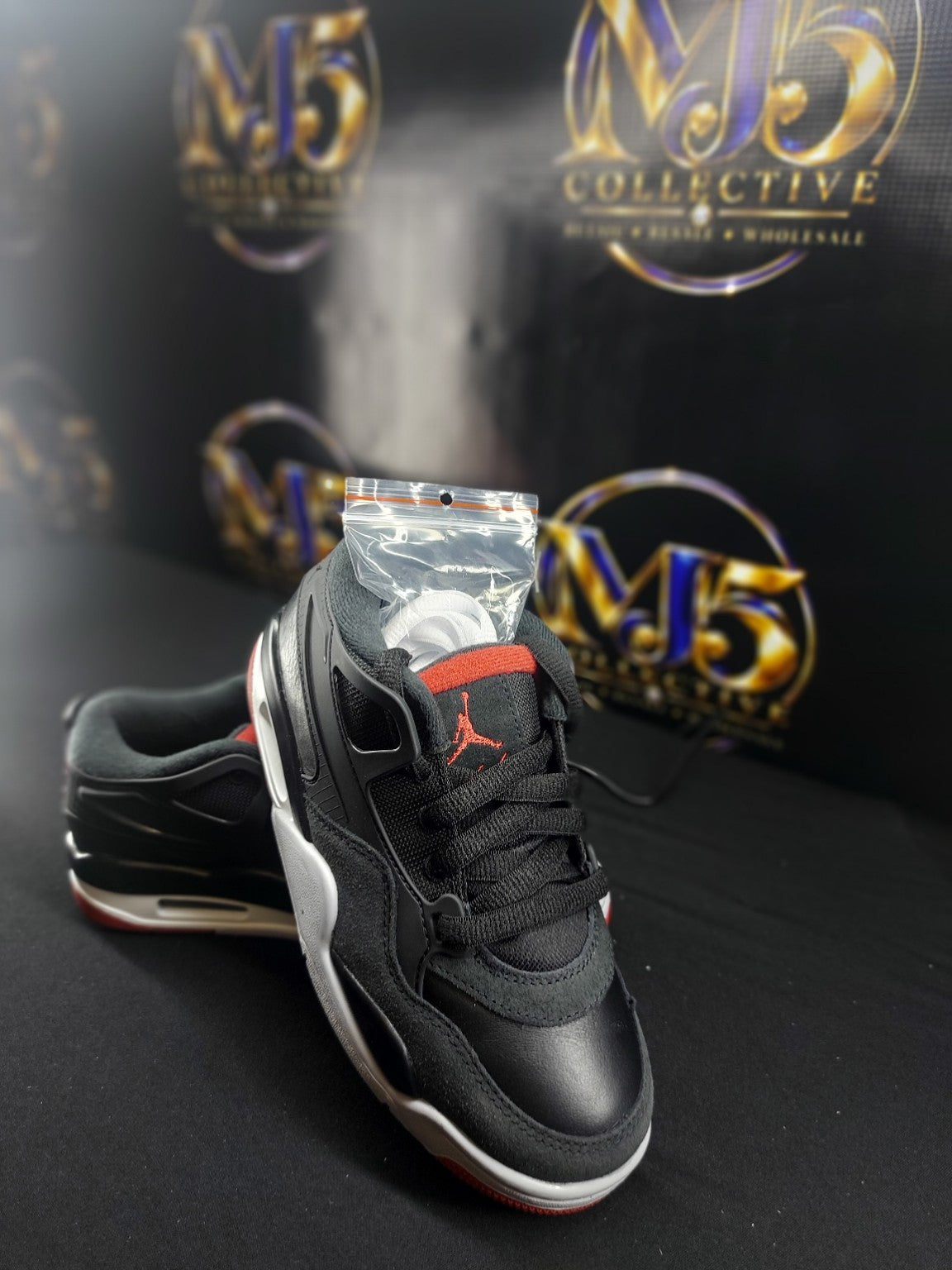 Air Jordan 4 RM GS Black Varsity Red Wolf Grey size 4Y pair
