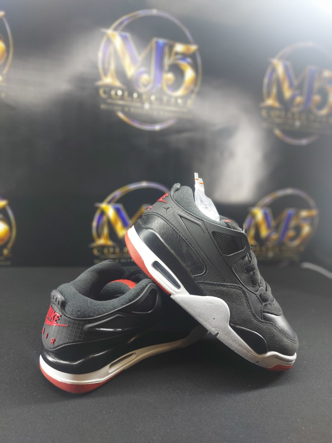 Air Jordan 4 RM GS Black Varsity Red Wolf Grey side view