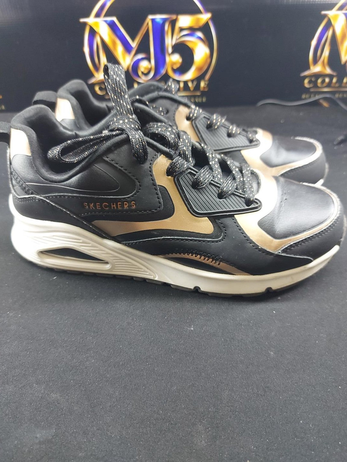 Skechers black gold actual original photo 2