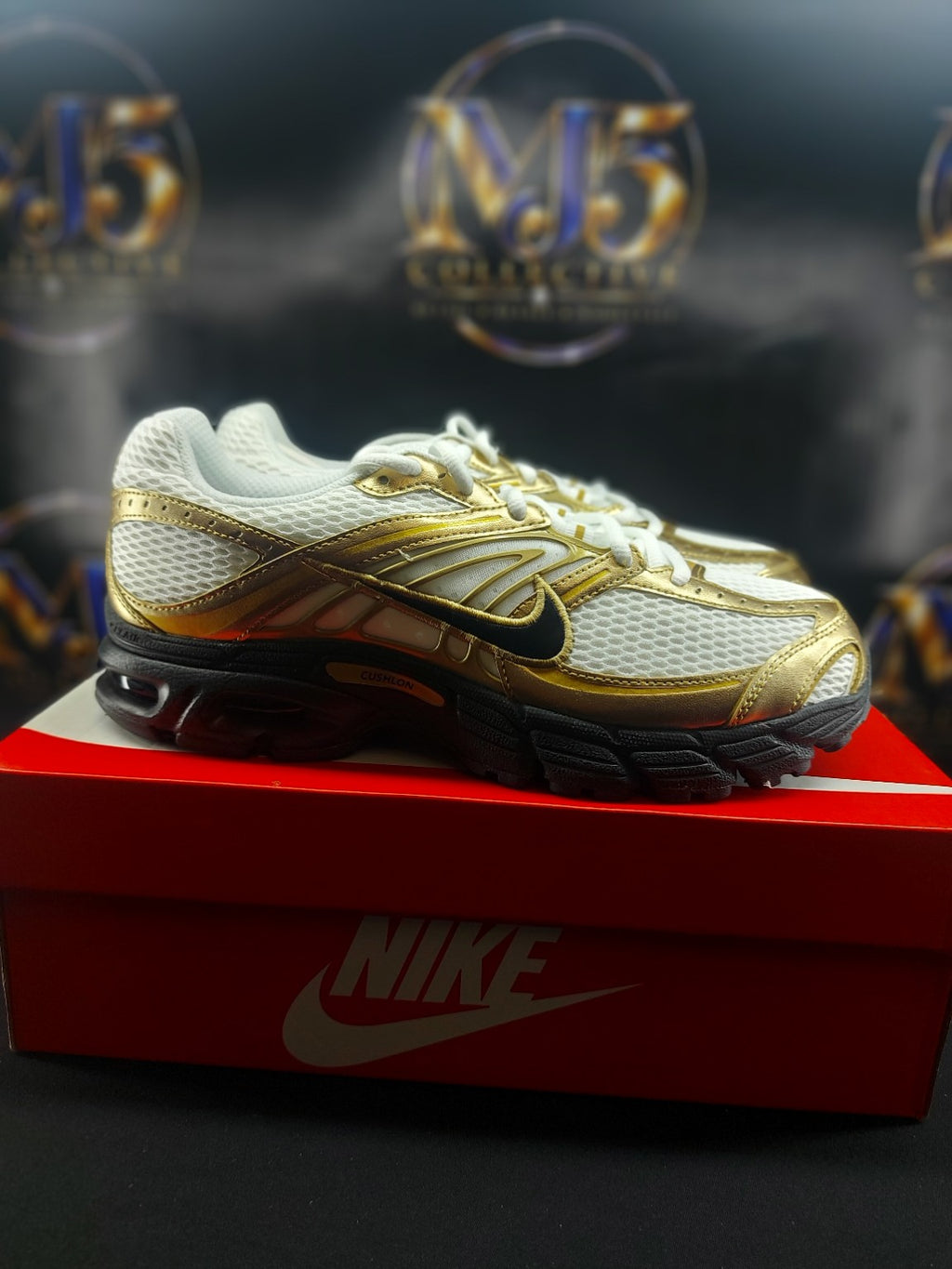 Nike Air Max Moto 2K White Metallic Gold side view on box