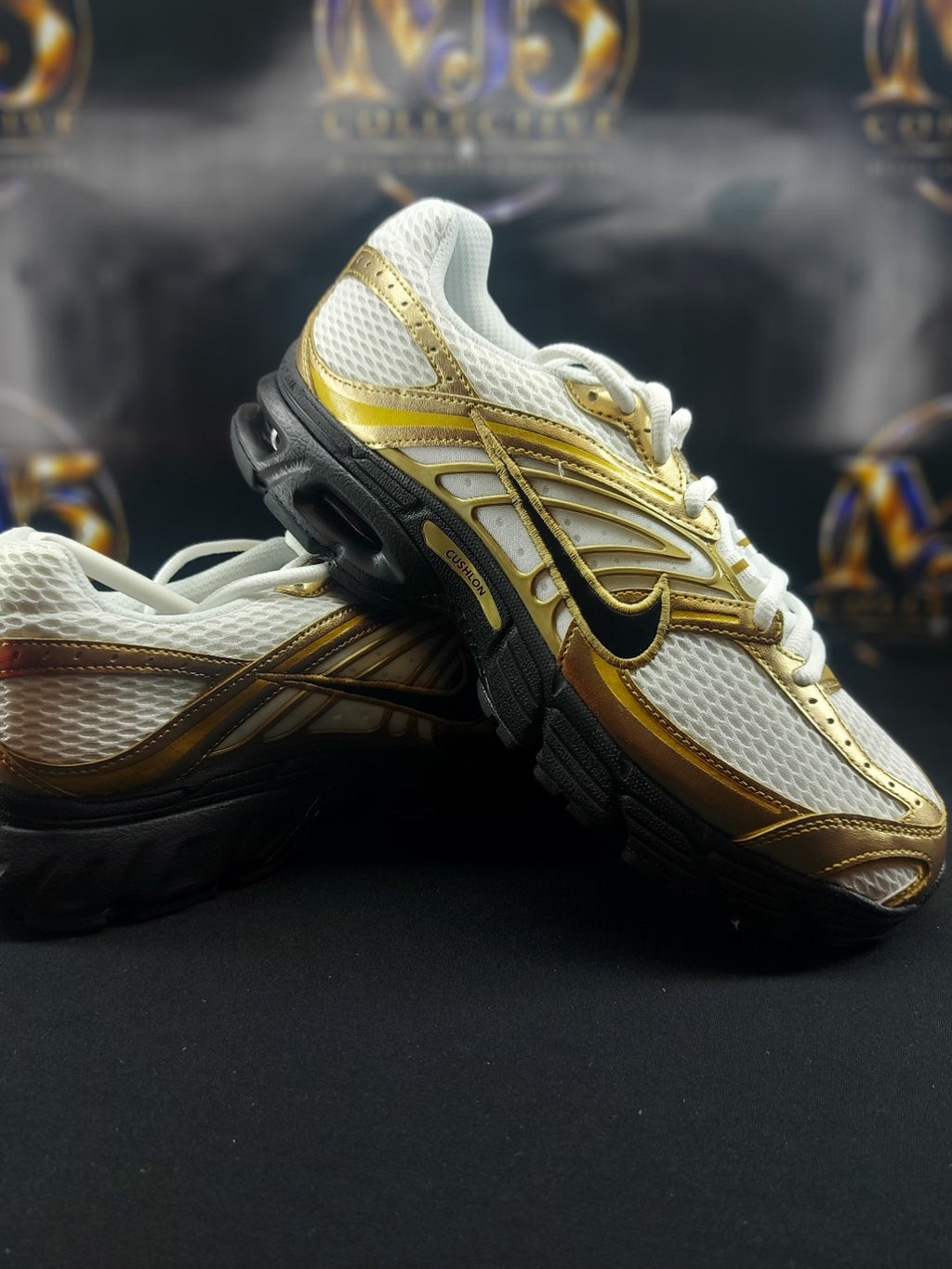 Nike Air Max Moto 2K White Black Metallic Gold pair detail