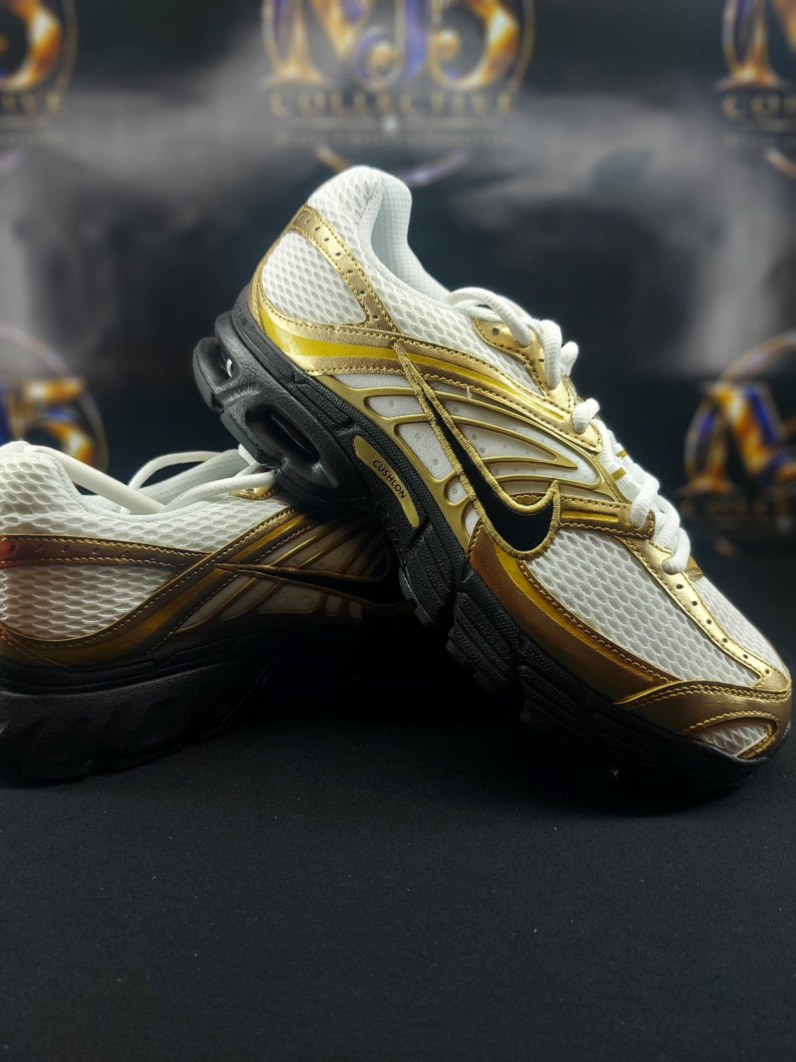 Nike Air Max Moto 2K White Black Metallic Gold pair detail