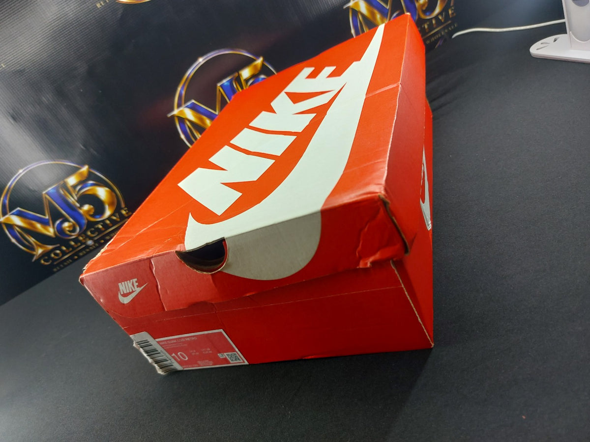 Nike Dunk Low Retro original box showing slight cosmetic damage